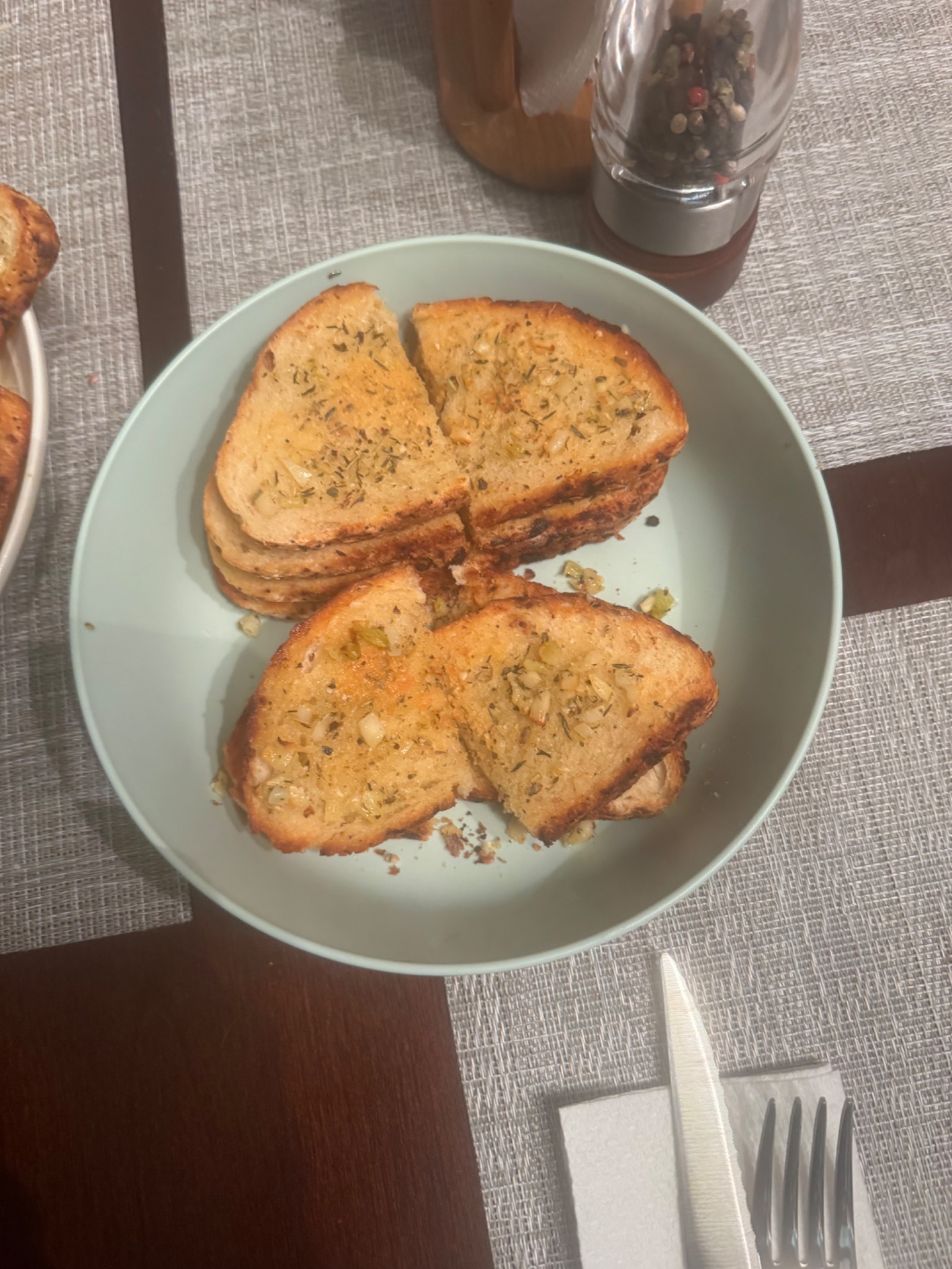 Garlic herb toast on a plate